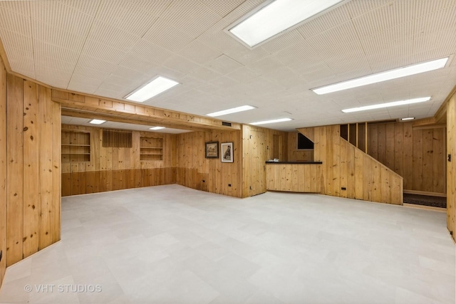 basement with wood walls