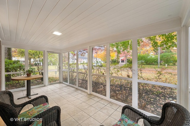 sunroom featuring wooden ceiling