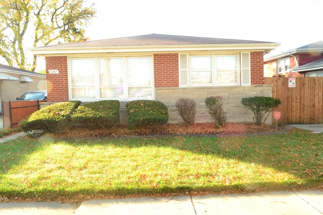 view of front of home with a front yard