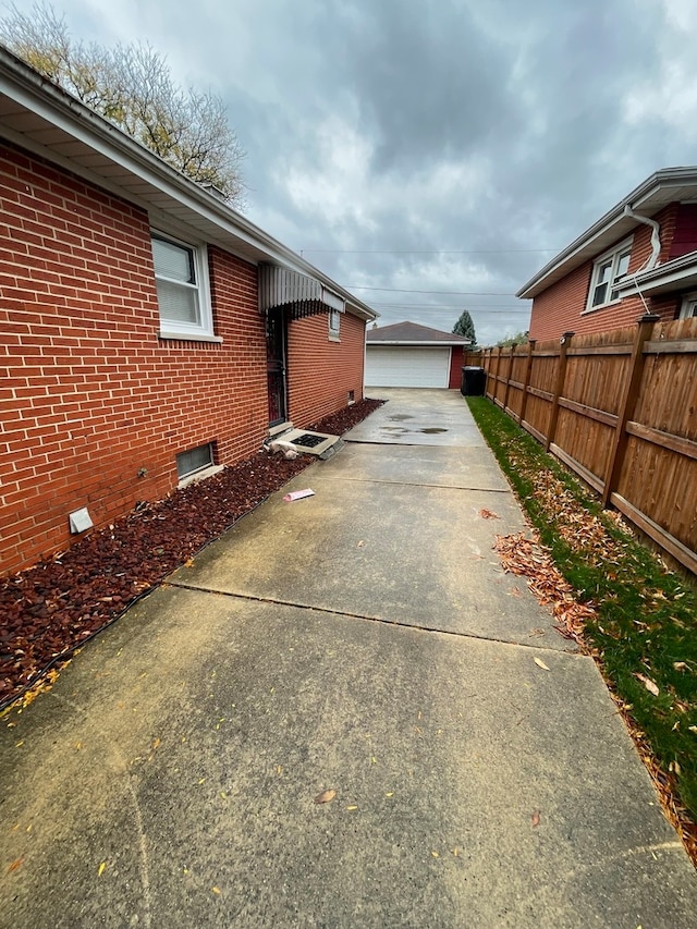 view of side of property with a garage