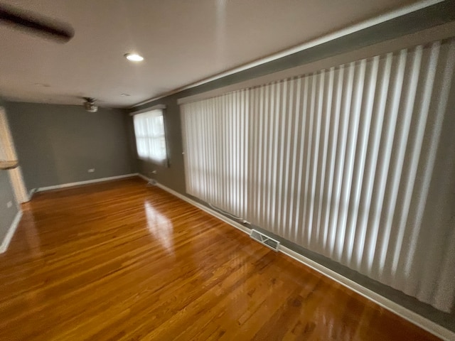 empty room featuring hardwood / wood-style flooring