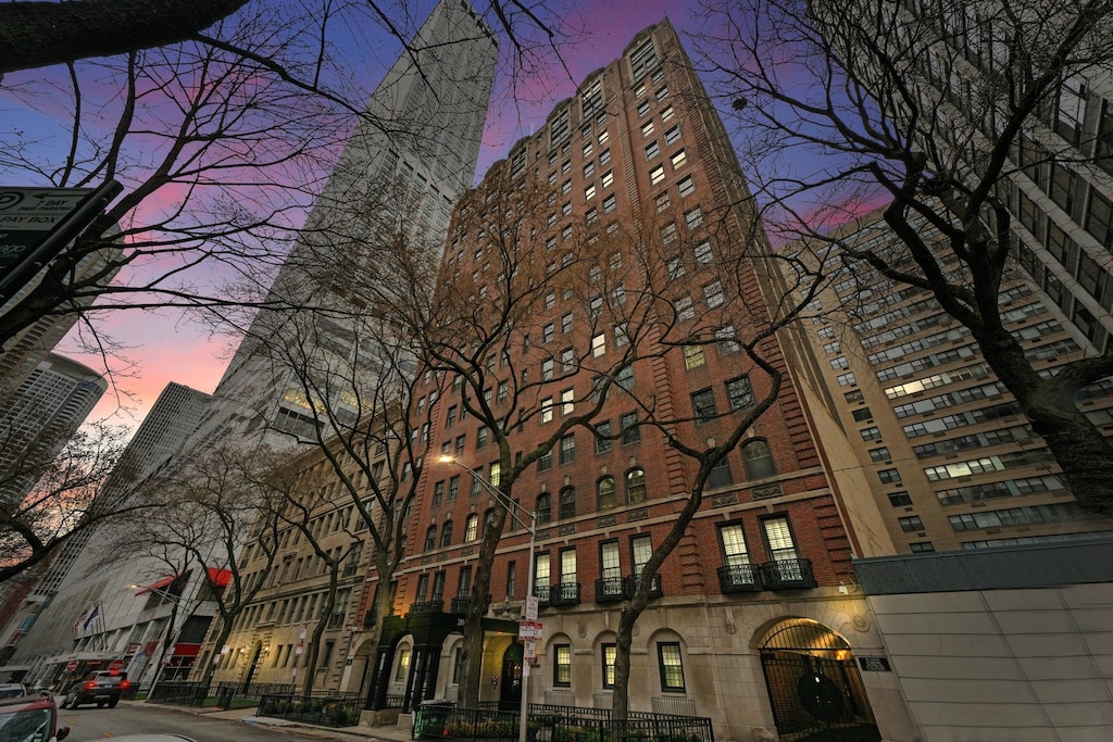 view of outdoor building at dusk