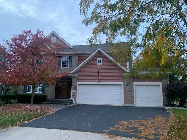 view of front of property featuring a garage