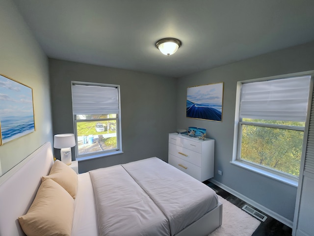 bedroom featuring hardwood / wood-style floors