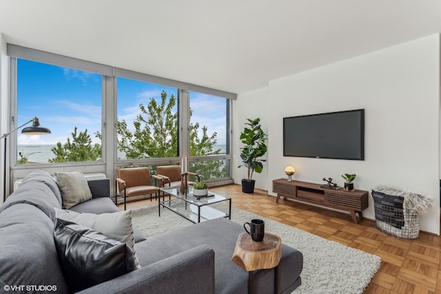 living room featuring parquet floors