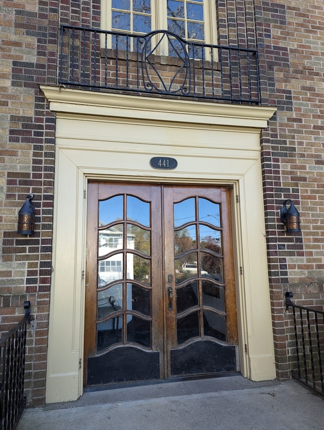 doorway to property featuring french doors and a balcony