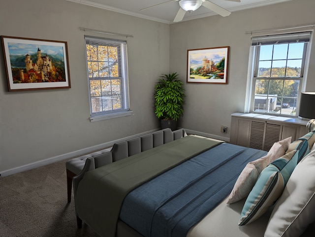 bedroom with carpet, ceiling fan, and crown molding