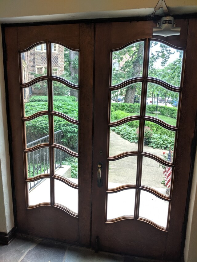 doorway featuring french doors and a healthy amount of sunlight