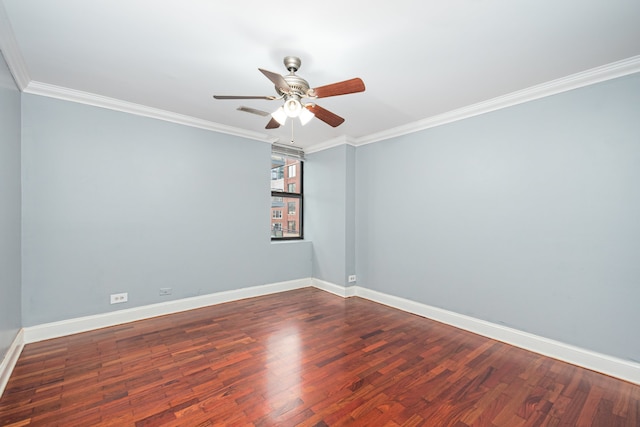 unfurnished room featuring ceiling fan, dark hardwood / wood-style floors, and crown molding