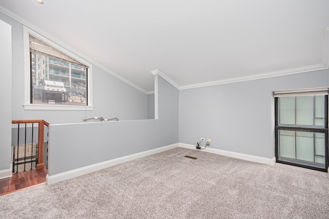 interior space with carpet flooring and vaulted ceiling