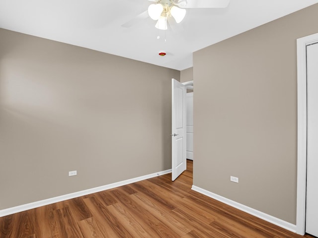 unfurnished bedroom with hardwood / wood-style flooring and ceiling fan