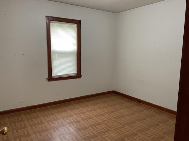 empty room with baseboards