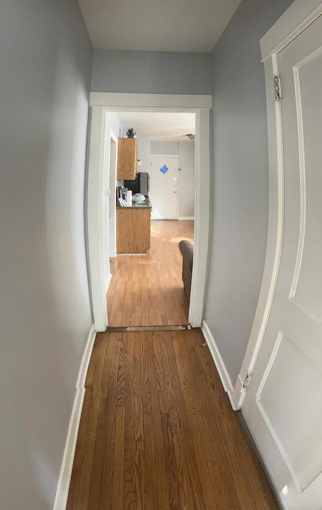 hallway featuring hardwood / wood-style floors