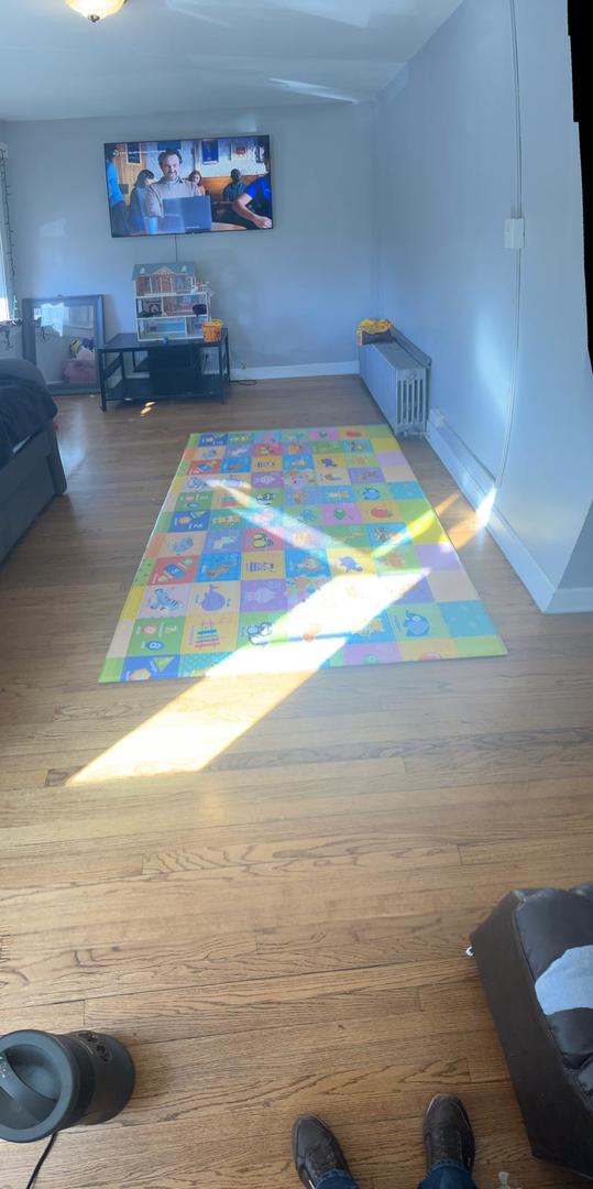 bedroom with hardwood / wood-style flooring