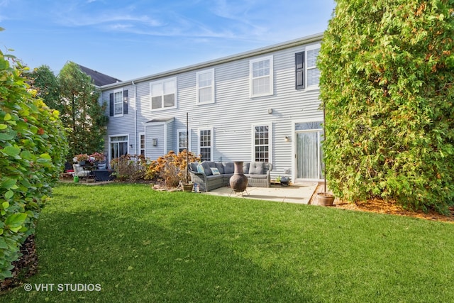 back of house with outdoor lounge area, a yard, and a patio area