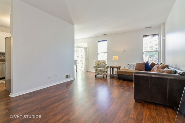 living room featuring dark hardwood / wood-style floors