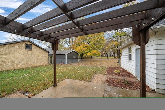 view of yard featuring a patio and a pergola