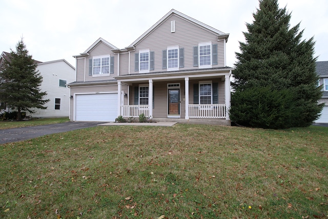 view of front of home featuring covered porch and a front yard