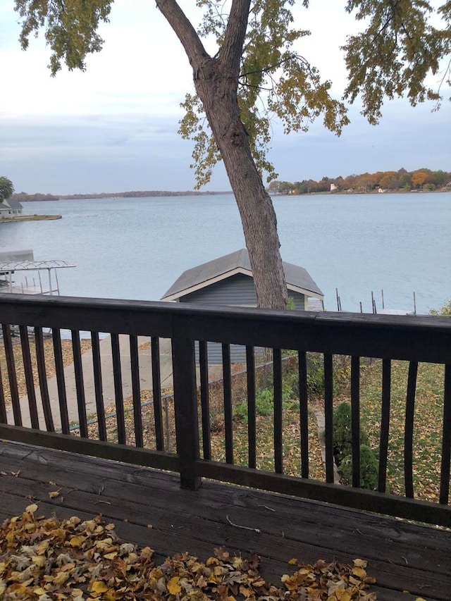 deck featuring a water view