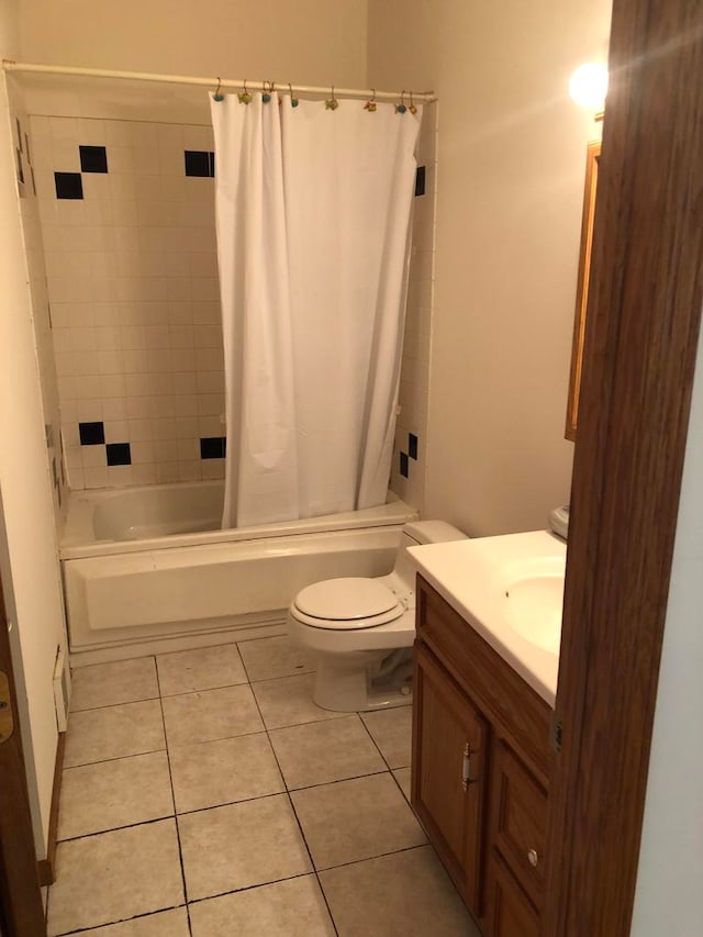 full bathroom with tile patterned flooring, vanity, shower / bath combination with curtain, and toilet