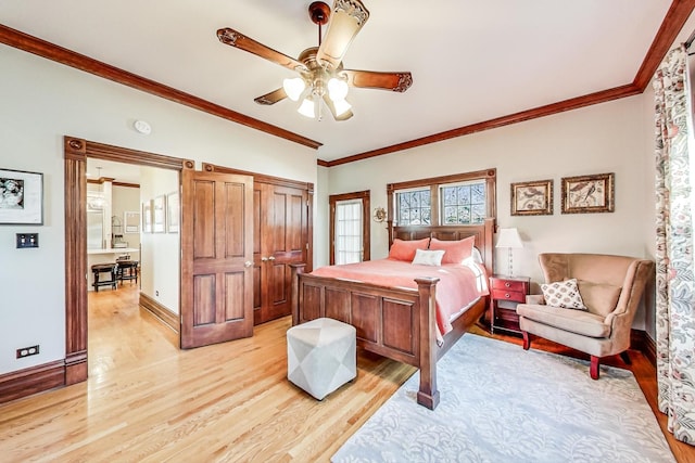 bedroom with ceiling fan, light wood-type flooring, and ornamental molding