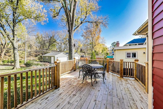 deck with an outdoor structure