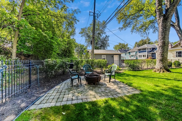 view of patio / terrace featuring an outdoor fire pit