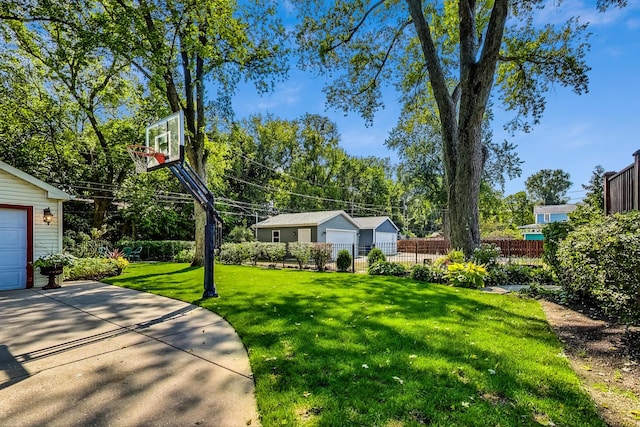 view of yard featuring basketball court