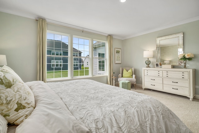 bedroom featuring ornamental molding and light colored carpet