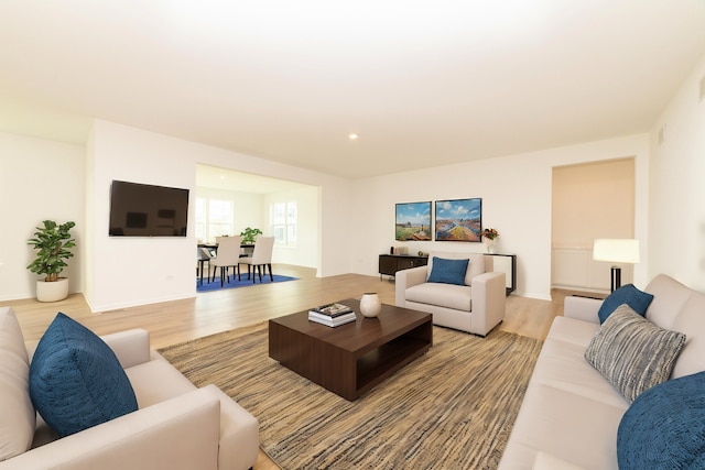 living room with light hardwood / wood-style flooring