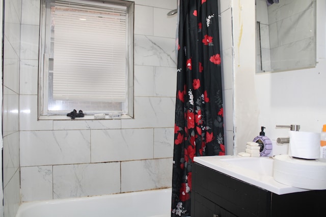 bathroom with vanity and shower / tub combo with curtain