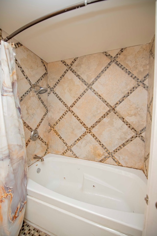 bathroom with shower / bath combination with curtain