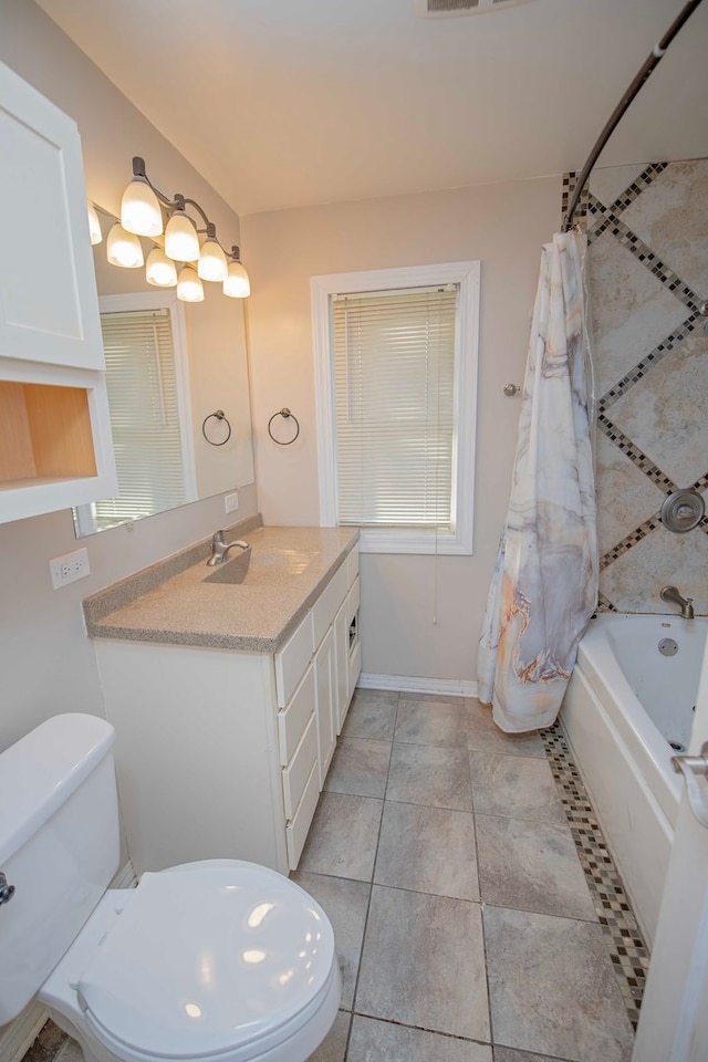 full bathroom with tile patterned floors, vanity, shower / bathtub combination with curtain, and toilet