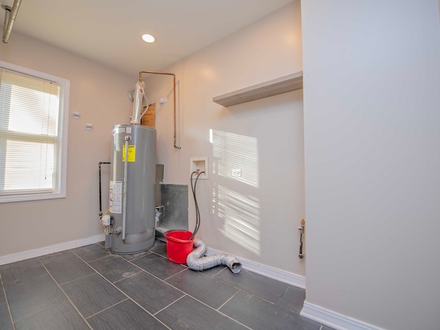 utility room with water heater