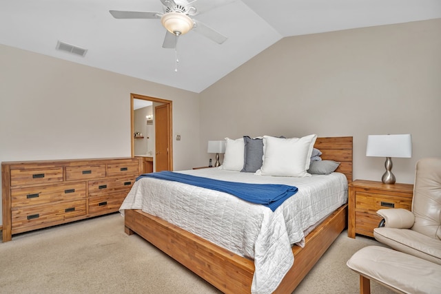 bedroom featuring ceiling fan, light colored carpet, and vaulted ceiling