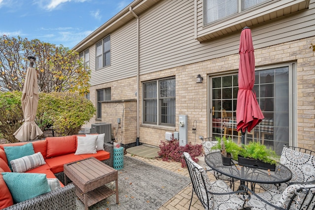 view of patio with an outdoor hangout area and central air condition unit