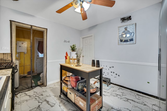 interior space featuring ceiling fan