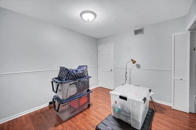 miscellaneous room featuring wood-type flooring