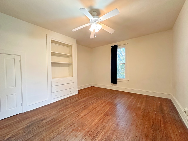 unfurnished bedroom with hardwood / wood-style flooring and ceiling fan