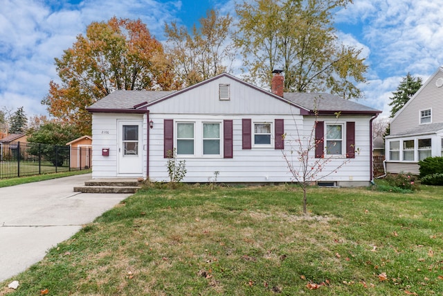 view of front of home with a front yard