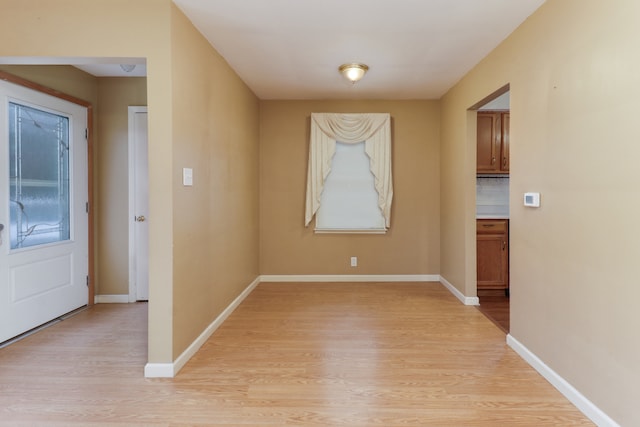 unfurnished dining area with light hardwood / wood-style flooring