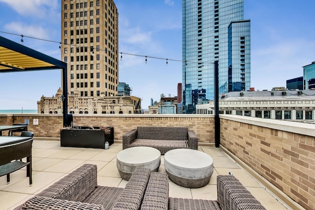 view of patio / terrace featuring a view of city