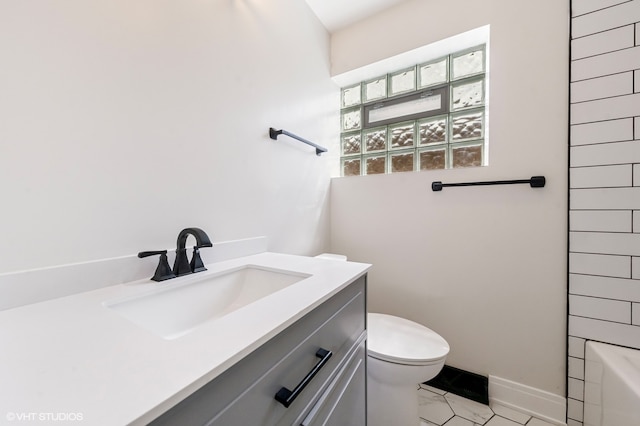 full bathroom featuring tile patterned flooring, vanity, toilet, and plus walk in shower