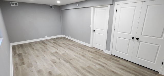 unfurnished bedroom featuring light hardwood / wood-style flooring