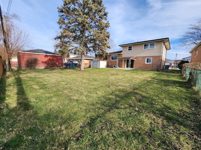 view of yard with a storage shed