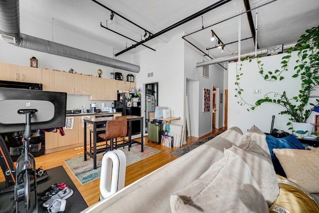 interior space with black fridge