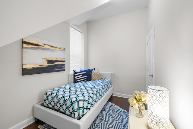 bedroom featuring dark hardwood / wood-style floors