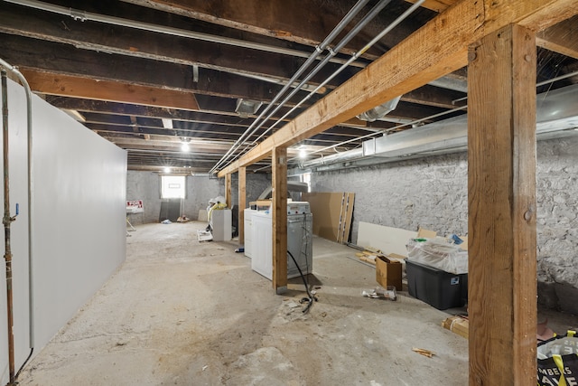 basement with washer / clothes dryer