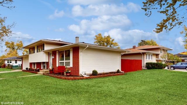 view of home's exterior featuring a yard