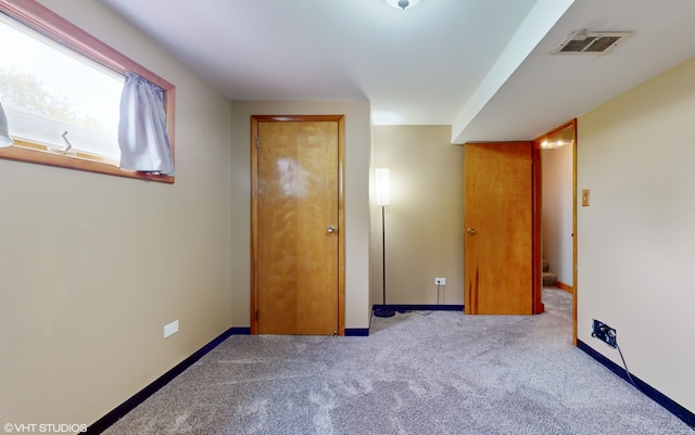 unfurnished bedroom with carpet